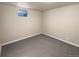 Simple bedroom with neutral walls, carpet and a window at 10547 Pompey Way, Northglenn, CO 80234