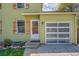 Charming two-story home featuring a well-maintained lawn, clear garage door, and inviting curb appeal at 10704 Moore St, Broomfield, CO 80021