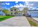 Charming two-story home featuring a well-maintained lawn, clear garage door, and inviting curb appeal at 10704 Moore St, Broomfield, CO 80021