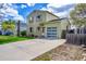 Charming two-story home featuring a well-maintained lawn, clear garage door, and inviting curb appeal at 10704 Moore St, Broomfield, CO 80021