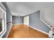 Inviting living room featuring hardwood floors, an open floor plan, and neutral paint at 10704 Moore St, Broomfield, CO 80021