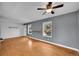 Inviting living room featuring hardwood floors, an open floor plan, and neutral paint at 10704 Moore St, Broomfield, CO 80021