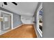 Inviting living room featuring hardwood floors, an open floor plan, and neutral paint at 10704 Moore St, Broomfield, CO 80021