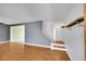 Inviting living room featuring hardwood floors, an open floor plan, and neutral paint at 10704 Moore St, Broomfield, CO 80021