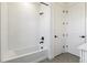 Modern bathroom with tiled shower and tub at 4331 Soapberry Pl, Castle Rock, CO 80108