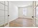 Bedroom with hardwood floors and French doors at 4331 Soapberry Pl, Castle Rock, CO 80108