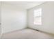 Bright bedroom featuring a large window that allows for natural light to illuminate the room at 4331 Soapberry Pl, Castle Rock, CO 80108