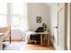 Comfortable seating area in the bedroom with a small table and decor at 4224 N Clay St, Denver, CO 80211