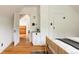 Spacious bedroom with hardwood floors and a view into another room at 4224 N Clay St, Denver, CO 80211