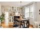 Stylish dining room featuring hardwood floors and an elegant chandelier at 4224 N Clay St, Denver, CO 80211