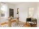 Home office with hardwood floors, unique desk, modern decor, and ample natural light at 4224 N Clay St, Denver, CO 80211