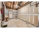 Spacious unfinished garage area ready for customization and storage solutions at 16149 E Rice Pl # A, Aurora, CO 80015