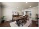 Spacious dining room showcasing hardwood floors and neutral wall paint at 9391 W Hialeah Pl, Littleton, CO 80123