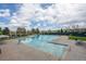 Large outdoor swimming pool with multiple lanes, sunbathing areas, and well-maintained surroundings at 9391 W Hialeah Pl, Littleton, CO 80123