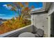 This balcony features outdoor seating and tree views, perfect for relaxing and enjoying the peaceful surroundings at 10380 W 55Th Ln # 204, Arvada, CO 80002