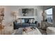 Inviting living room with a cozy sofa, stylish lamps, and tasteful decor at 10380 W 55Th Ln # 204, Arvada, CO 80002