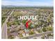 Aerial view of a neighborhood showcasing the home's location and surrounding community at 12433 Bellaire Dr, Thornton, CO 80241