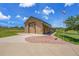 Barn on property is beige and has a large garage door with an American flag visible at 25741 E Kettle Cir, Aurora, CO 80016