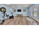 Finished basement with workout equipment, flooring, and natural light at 25741 E Kettle Cir, Aurora, CO 80016