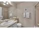 Bathroom with a shower, toilet, and sink at 25741 E Kettle Cir, Aurora, CO 80016