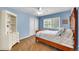 Cozy bedroom with natural light, a ceiling fan, and neutral carpet at 25741 E Kettle Cir, Aurora, CO 80016