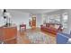 Inviting living room with hardwood floors, natural light, and comfortable seating at 25741 E Kettle Cir, Aurora, CO 80016