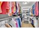 Walk-in closet with ample hanging space and shelving for organization at 25741 E Kettle Cir, Aurora, CO 80016