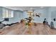 This workout room features modern exercise equipment, wood-look flooring, and natural light at 25741 E Kettle Cir, Aurora, CO 80016