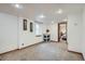 Finished basement with carpet and natural light at 1230 S Emerson St Dr, Denver, CO 80210