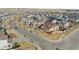 Aerial view showcasing homes in a residential neighborhood, emphasizing street layout at 24192 E Alamo Dr, Aurora, CO 80016