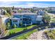 Aerial view of a home showcasing its landscaping, outdoor spaces, and neighborhood at 10095 S Shadow Hill Dr, Lone Tree, CO 80124