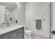 Clean bathroom featuring a glass-enclosed shower and sleek vanity at 10095 S Shadow Hill Dr, Lone Tree, CO 80124