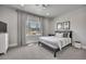 Comfortable bedroom featuring a ceiling fan and large window with natural light at 10095 S Shadow Hill Dr, Lone Tree, CO 80124