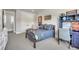 Bedroom with sports decor, a ceiling fan, desk and a double-door closet at 10095 S Shadow Hill Dr, Lone Tree, CO 80124