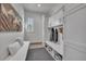 Functional mudroom with built-in storage, bench seating, and ample space for organization at 10095 S Shadow Hill Dr, Lone Tree, CO 80124
