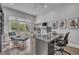 Bright office with a large window, work area, comfortable chair, and contemporary decor at 10095 S Shadow Hill Dr, Lone Tree, CO 80124