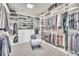 Large walk-in closet with custom shelving and ample storage space at 10095 S Shadow Hill Dr, Lone Tree, CO 80124