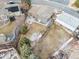 Aerial view of property showcasing the home's layout, spacious backyard, and surrounding neighborhood at 1513 S Beech St, Lakewood, CO 80228