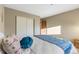 Cozy bedroom featuring neutral paint, carpet, and a closet at 1513 S Beech St, Lakewood, CO 80228