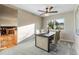 Open-concept dining room features a modern light fixture and a dining table with four chairs at 1513 S Beech St, Lakewood, CO 80228