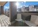 Outdoor balcony features two chairs and overlooks the surrounding neighborhood at 1625 King St # 4, Denver, CO 80204