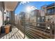 Balcony with outdoor seating and views of the neighborhood's modern architecture at 1625 King St # 4, Denver, CO 80204