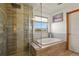 Relaxing bathroom features a soaking tub and step-in shower at 6279 Cheyenne Ct, Parker, CO 80134