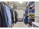 The walk-in closet provides ample shelving and hanging space for clothing and accessories at 6279 Cheyenne Ct, Parker, CO 80134