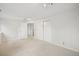Bedroom featuring neutral carpet, track lighting, and a double door closet at 723 Eaton Rd, Palmer Lake, CO 80133