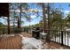 Enjoy views from this wooden deck with a natural gas grill and outdoor seating at 723 Eaton Rd, Palmer Lake, CO 80133