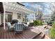 Charming backyard with a pergola, outdoor seating, and a decorative rock garden feature at 479 Blue Lake Trl, Lafayette, CO 80026