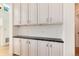 Built-in cabinets with a dark countertop offer ample storage space in this home at 479 Blue Lake Trl, Lafayette, CO 80026