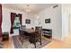 Inviting dining room featuring hardwood floors, ample natural light, and elegant furnishings at 479 Blue Lake Trl, Lafayette, CO 80026