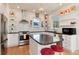 Stylish kitchen with granite countertops, stainless steel appliances, and an island with seating for casual dining at 479 Blue Lake Trl, Lafayette, CO 80026